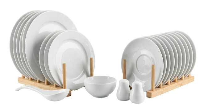 Elegant white ceramic dinnerware set with plate rack display isolated on a sleek black background