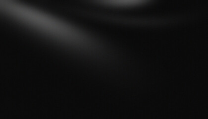 Smooth grey gradation to black background with noise texture.
