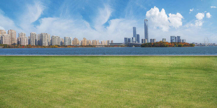 The skyline of modern urban architecture and the scenery of Jinji Lake in Suzhou, Jiangsu Province, China, on December 8, 2025