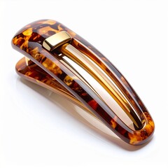 Close Up Tortoiseshell Hair Clip with Gold Accent on White Background