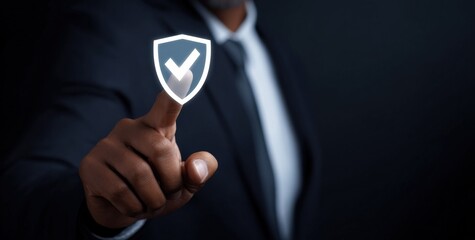 African male adult touching virtual shield icon for cybersecurity concept
