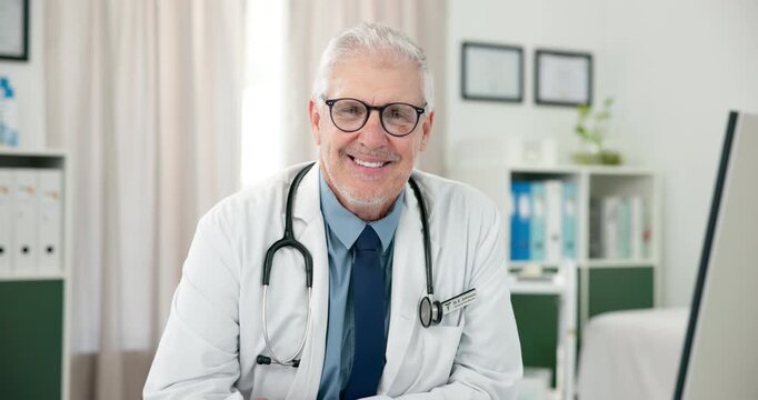 Doctor, mature man and smile with face in office with paperwork for medical admin or online consulting. Person, medicine expert and portrait in clinic with confidence, technology and healthcare