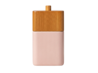 Isolated modern grinder for salt, pepper or spices in pink and wood for the kitchen at home