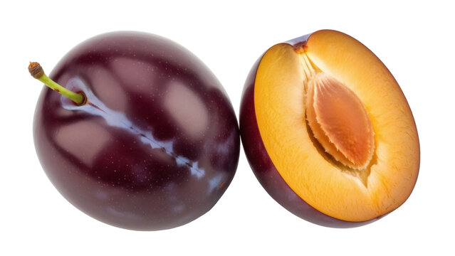Isolated ripe plums halved and whole close-up, healthy seasonal purple fruit, fruit pit core