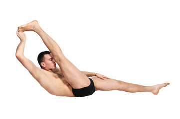Obraz premium A muscular man doing a yoga asana.