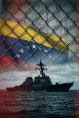 Obraz premium Venezuelan flag behind chain link fence with military naval warship on ocean symbolizing naval blockade maritime restriction conflict sanctions barrier geopolitical tension