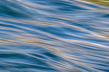 motion of blue water soft flowing ripples and waves abstract for background