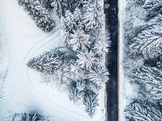 Winter magic in the Julian Alps. Lake Predil seen from above. Between snow and ice.