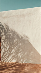Minimal Mediterranean wall with palm leaf shadows in warm sunlight