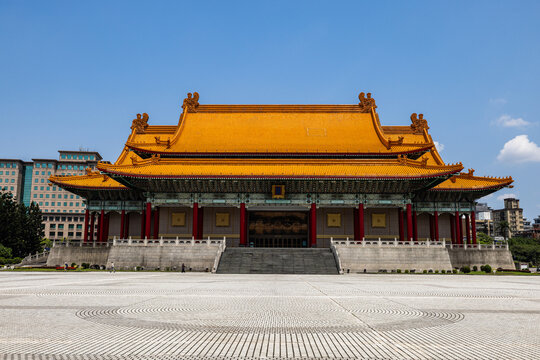 View of the National Theater stands majestically with its traditional golden roof against the clear blue sky, Liberty Square, Taipei City, Taiwan.