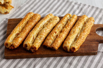 Homemade Rollini with Chicken on a Wooden Board, side view.