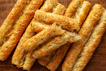 Homemade Rollini with Chicken on a Wooden Board, top view. Close-up.