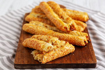 Homemade Rollini with Chicken on a Wooden Board, side view. Close-up.