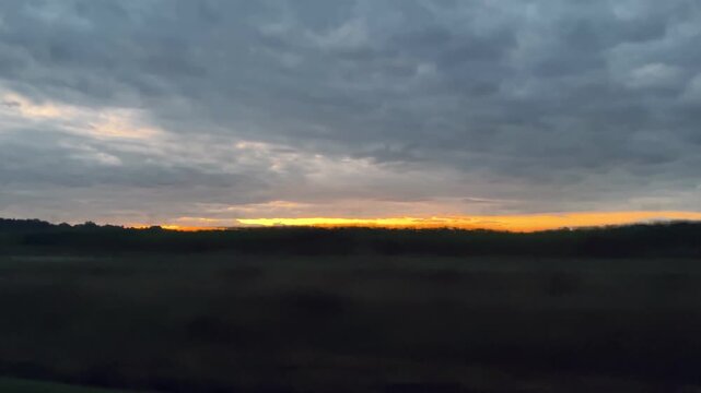 Moody evening sky . Blurred foreground adds a sense of motion and depth to this peaceful yet dramatic nature landscape.