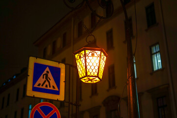 Vintage Street Lamp Illuminating a Night City Scene