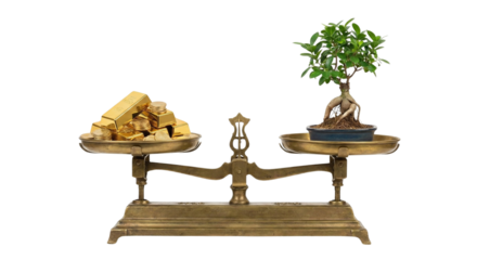 Balance scale with gold bars and bonsai tree