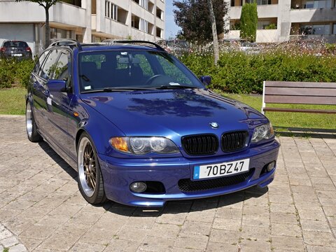 BMW 3 Series E46 touring station wagon parked outdoors