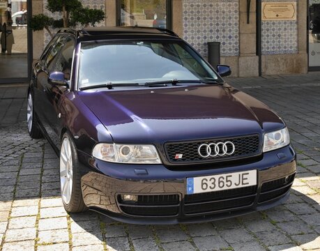 Audi S4 B5 Avant parked on cobblestone street