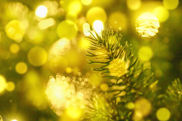 Festive Christmas greeting card, blurred effect. New Year holiday concept. Shiny baubles, garland