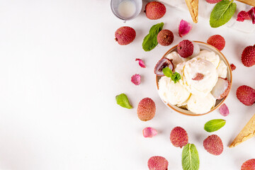 Tasty lychee sorbet ice cream. Lychee fruit gelato, in portioned bowl, on white pink background,...