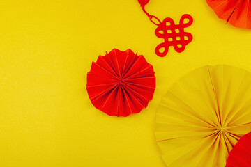 Happy Chinese New Year traditional concept. Oriental asian style paper fans on red background