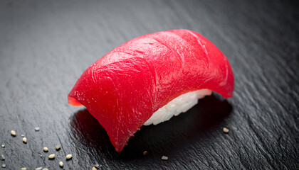negitoro minced tuna sushi on black background, green onion garnish, smooth texture