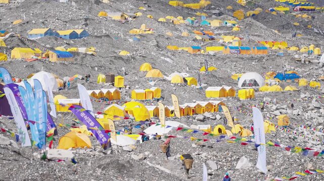 Everest Base Camp Colorful Tents and Climbers in Himalayas
