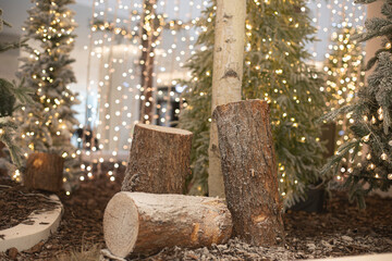 White Christmas tree with logs. new year concept