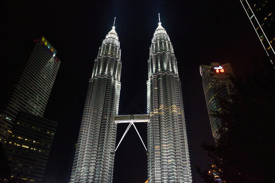 KUALA LUMPUR, MALAYSIA - JULY 18, 2023: Petronas Towers. Petronas Towers, also known as Menara Petronas is the tallest buildings in the world from 1998 to 2004.