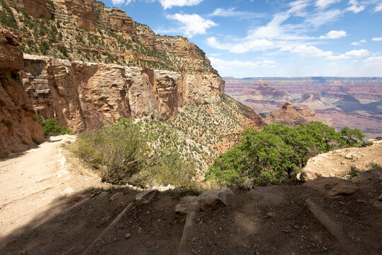 Grand Canyon overlook from rugged trail edge
