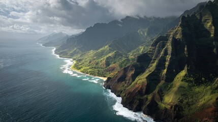 Dramatic coastal mountains meet turquoise ocean waves