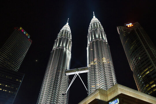 KUALA LUMPUR, MALAYSIA - JULY 18, 2023: Petronas Towers. Petronas Towers, also known as Menara Petronas is the tallest buildings in the world from 1998 to 2004.