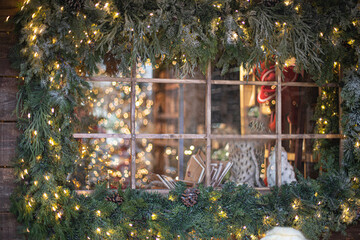Window with Christmas, New Years decorations.