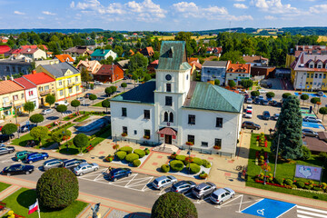Aerial view of old town center with historic Ratusz Town Hall at Rynek market square of Sedziszow Malopolski town in Podkarpacie region of Lesser Poland
