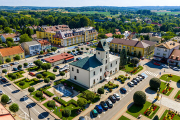 Aerial view of old town center with historic Ratusz Town Hall at Rynek market square of Sedziszow Malopolski town in Podkarpacie region of Lesser Poland