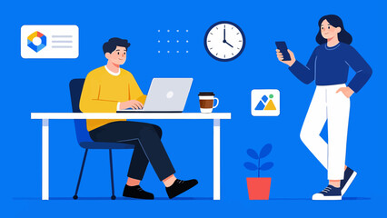 Two people working at a desk with laptop