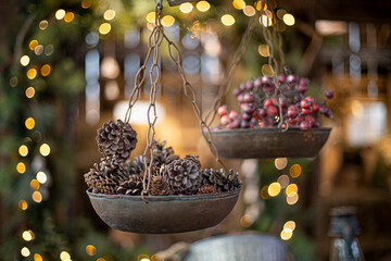 Cone and branch of fir-tree on basket