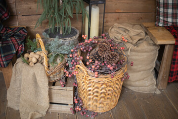 Cone and branch of fir-tree on basket