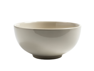 A white ceramic bowl sits on a table with a simple yet elegant design