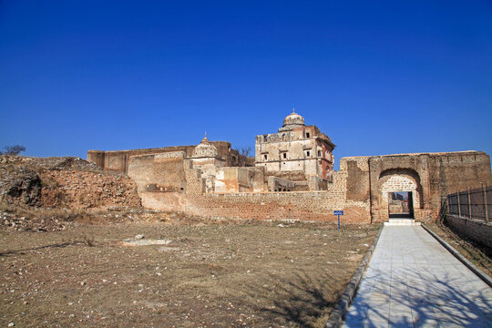 View of ancient Katas Raj Temple stands majestically with its sandstone walls under a clear blue sky, inviting exploration and reflection, Katas, Punjab, Pakistan.