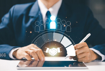 A business professional signs documents with a digital partnership and HR collaboration interface, representing teamwork, business agreements, employee relations, corporate collaboration.