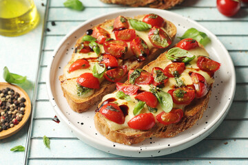 Freshly made bruschetta sandwiches - traditional dish of Italian cuisine	