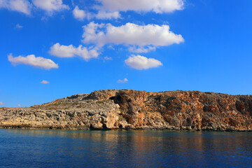 Naklejka premium Rocks in the sea off the coast of Cyprus. Warm sea and picturesque coastal