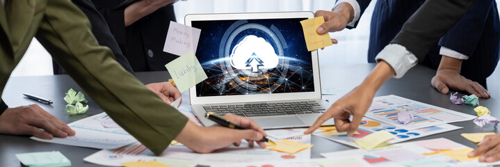 Analyst team use sticky note for creative and analytic brainstorm for business idea with BI data dashboard on laptop screen. Analysis financial data visualization tech for marketing strategy. Prodigy