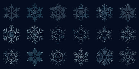 A collection of intricate blue pixelated snowflakes against a dark background