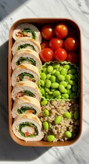 Healthy Bento Box with Chicken, Quinoa, and Fresh Vegetables