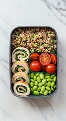 Healthy Lunchbox with Quinoa, Vegetables, and Wraps