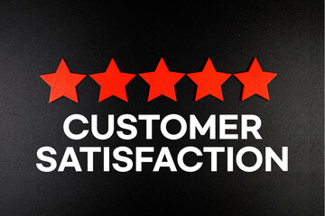 Consumer Satisfaction text with five star on black background