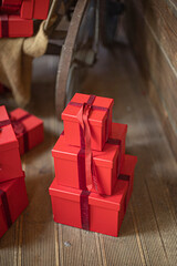Gift boxes piled in a heap. Mountain of Christmas gifts close-up.