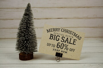 Festive display with small decorative Christmas trees with 